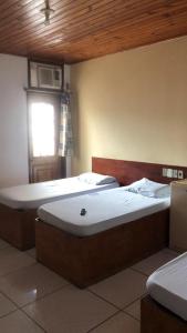 Cama o camas de una habitación en Hotel Splendor