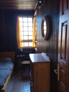 A bed or beds in a room at Chalet Rural Marian