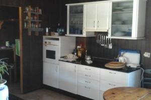 A kitchen or kitchenette at Chalet Rural Marian