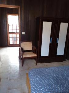 A bed or beds in a room at Chalet Rural Marian