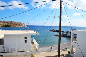 a view of the beach from a house at Georgias Apartments in Haraki