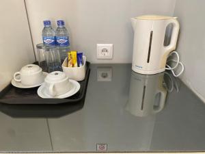TETE PALM HOTEL的咖啡和沏茶工具
