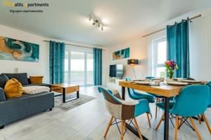 Telewizja i/lub zestaw kina domowego w obiekcie Baltic Apartments - Sun Towers