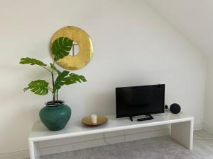 TV a/nebo společenská místnost v ubytování City Flat gegenüber Kurhaus, Zentrum Freudenstadt