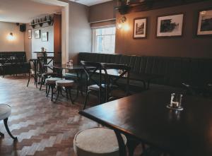 a row of tables and chairs in a restaurant at The Canal in Whatstandwell