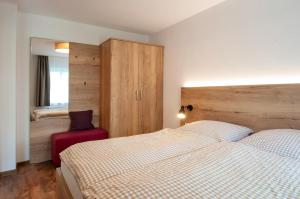 Letto o letti in una camera di Glockenhof Studtmann