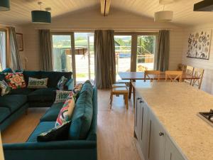 Et opholdsområde på Stag Lodge School House Farm + 15 billeder