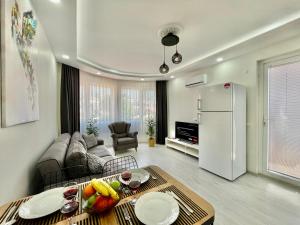 Kuchyň nebo kuchyňský kout v ubytování Tatil Premium Cozy Suite