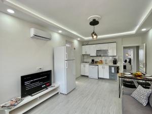 Kuchyň nebo kuchyňský kout v ubytování Tatil Premium Cozy Suite + 11 fotografií