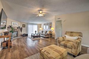 a living room filled with furniture and a ceiling fan at Family-Friendly San Marcos Home Close to TSU! in San Marcos
