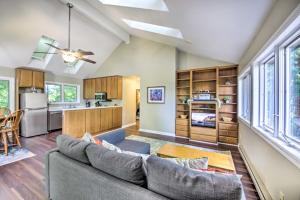 a living room with a couch and a kitchen at Peaceful Nashville Hideaway Near State Parks! in Nashville +16 photos