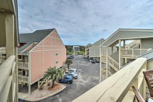 an aerial view of a parking lot at a resort at Beachfront Condo with Unobstructed Ocean Views! in Oak Island