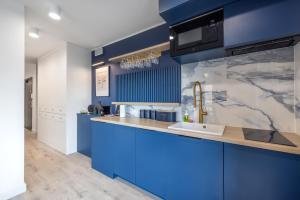 Kuchyňa alebo kuchynka v ubytovaní Apartament Centrum Gdańska blisko Starego Miasta