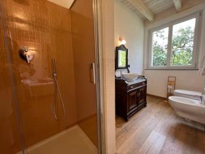 a bathroom with a shower and a sink at Agriturismo Torsivì in Castiglione Chiavarese