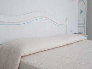 A bed or beds in a room at Affittacamere Solki