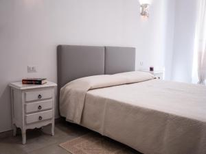 A bed or beds in a room at Affittacamere Solki