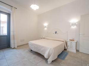 A bed or beds in a room at Affittacamere Solki