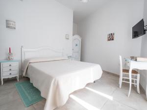 A bed or beds in a room at Affittacamere Solki