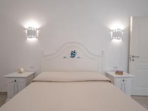 A bed or beds in a room at Affittacamere Solki