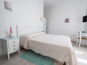 A bed or beds in a room at Affittacamere Solki