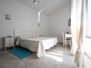 A bed or beds in a room at Affittacamere Solki