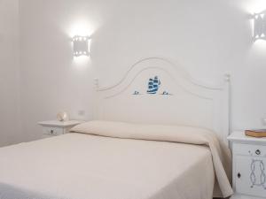 A bed or beds in a room at Affittacamere Solki