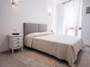 A bed or beds in a room at Affittacamere Solki