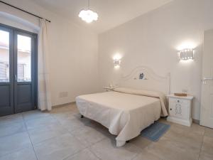 A bed or beds in a room at Affittacamere Solki