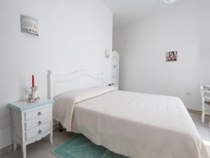 A bed or beds in a room at Affittacamere Solki