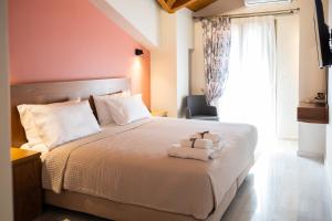 A bed or beds in a room at Patras Casale
