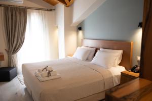 A bed or beds in a room at Patras Casale