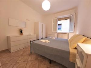 Posteľ alebo postele v izbe v ubytovaní Bologna Apartment