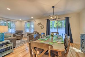 a dining room with a table and chairs at Sun-Dappled Retreat - Walk to Wickaboag Lake! in West Brookfield