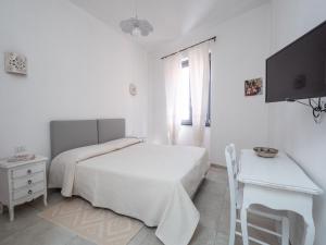 A bed or beds in a room at Affittacamere Solki