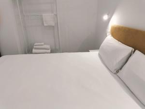 Postel nebo postele na pokoji v ubytování Apartamentos La Brava by gaiarooms