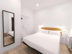 Postel nebo postele na pokoji v ubytování Apartamentos La Brava by gaiarooms