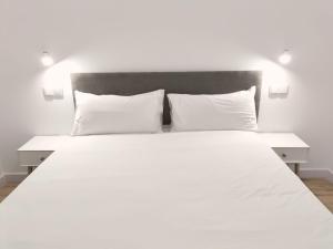 Postel nebo postele na pokoji v ubytování Apartamentos La Brava by gaiarooms