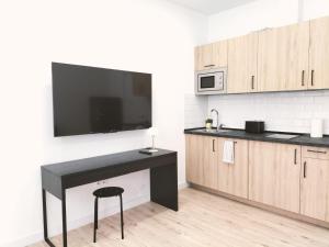 Kuchyň nebo kuchyňský kout v ubytování Apartamentos La Brava by gaiarooms