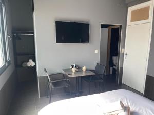Letto o letti in una camera di Logements des choraux