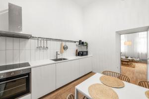 Kuchyň nebo kuchyňský kout v ubytování The BoHo Loft VIE + 6 fotografií