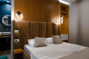 Katil atau katil-katil dalam bilik di Luna Mare Seaside Suites
