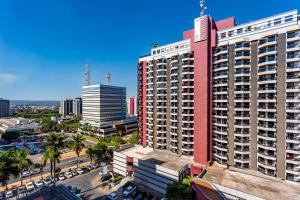 an aerial view of a tall building in a city at Apart Hotel Centro de Brasília in Brasilia