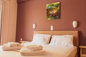 Postel nebo postele na pokoji v ubytování Apagio Apartments