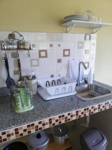 Kuchyň nebo kuchyňský kout v ubytování Hotel VILLAS DON PABLO LAS TABLAS