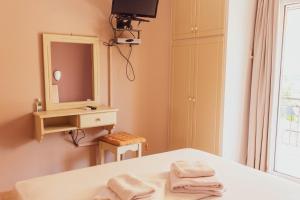 Postel nebo postele na pokoji v ubytování Apagio Apartments