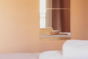 Postel nebo postele na pokoji v ubytování Apagio Apartments