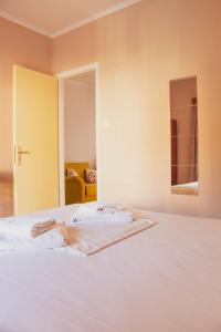 Postel nebo postele na pokoji v ubytování Apagio Apartments