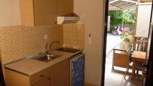 Kuchyň nebo kuchyňský kout v ubytování Apagio Apartments