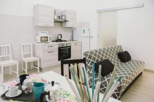 A kitchen or kitchenette at Casa Grazia Guest House