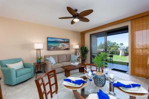 a living room with a couch and a table at Napili Point B33 1 Bedroom Oceanfront Condo condo in Kahana
